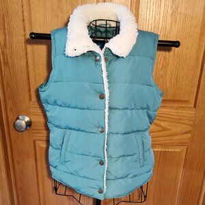 Maurices teal puffer vest with white sherpa trim, excellent used cond. size L